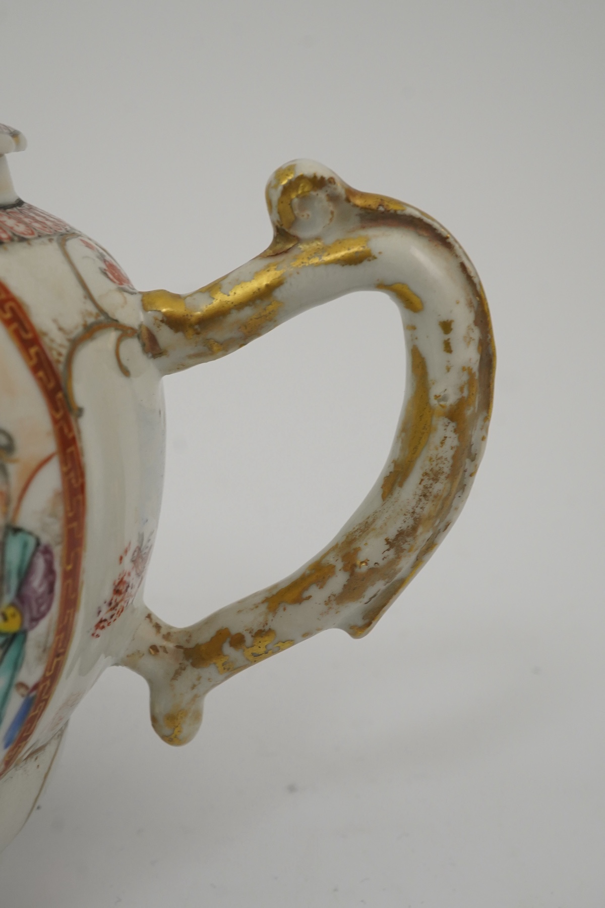 A Chinese famille rose ‘mandarin’ ogee shaped teapot, Qianlong period